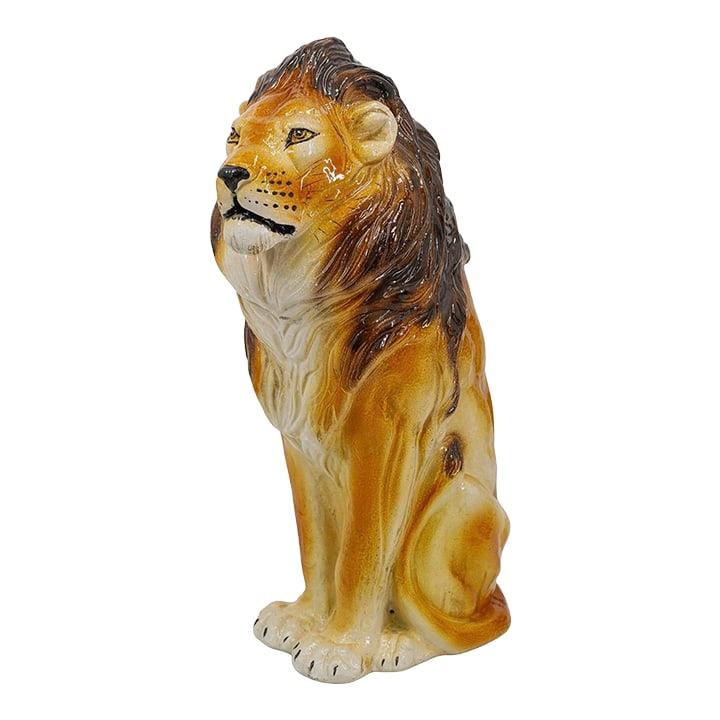 Mid 20th Century Italian Majolica Pottery Guardian Lion Statue: This handsome gentleman (whom we affectionately call Larry) stands a proud 24" tall. With some of the most realistic detailing we've seen yet, this regal lion demonstrates a serene strength, ready to 