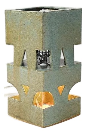 Contemporary Green Double-Bulbed Ceramic Table Lamp: Part of the Cloister lamp series, this compact architectural form explores how geometric openings create passages for light. Starting with a standard rectangular cast that's divided horizontally and i