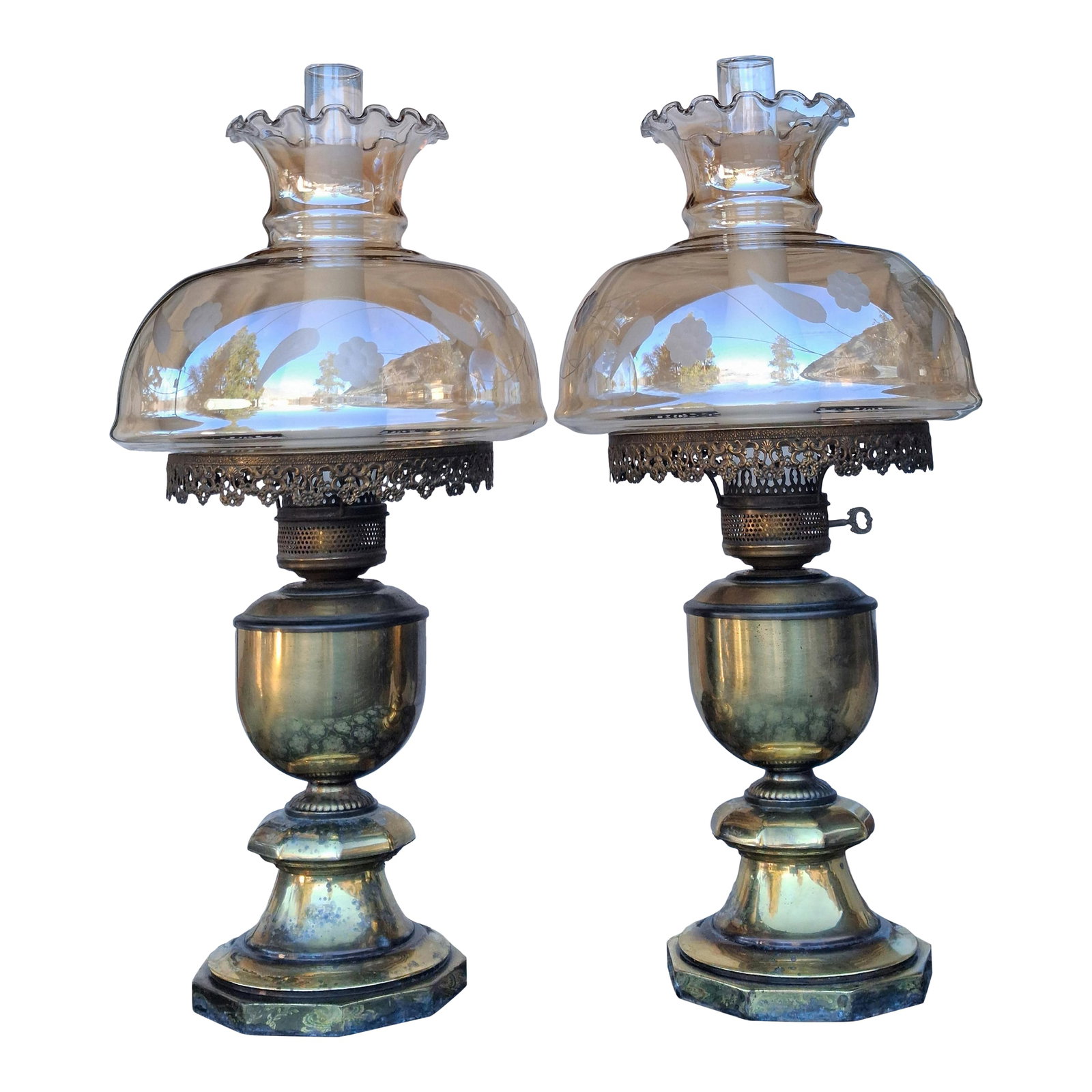 1900 Victorian Banquet Lamps. Matching - a Pair: Matched pair of late-Victorian brass banquet lamps, dating to approximately 1885-1905. Each lamp features a solid brass base with original aged patina, a pierced brass gallery, and a beautiful origina