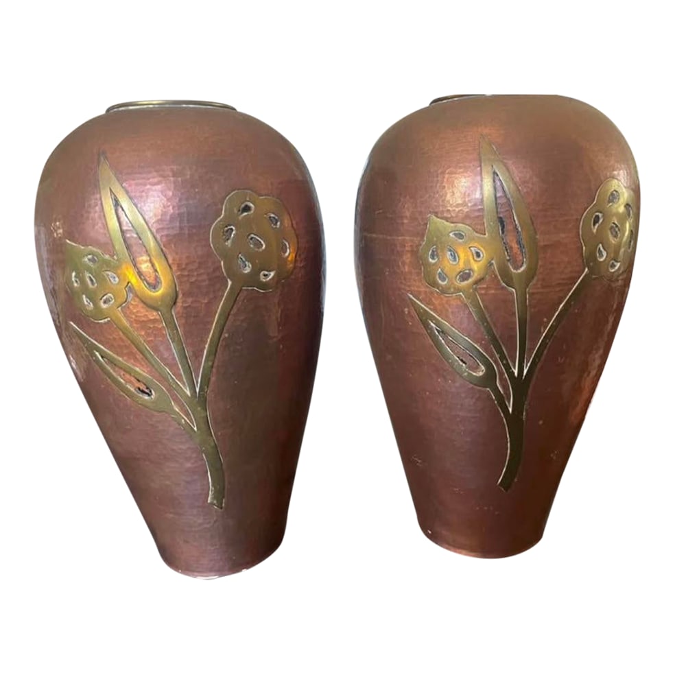 Rare Pair of Vintage Hammered Copper Urns With Brass Lotus Flower Inlay: Pair of rare vintage hammered copper vases with brass inlay floral lotus design. They were passed down in a Texas family 4 generations. Beautiful patina- haven't changed a thing. After consulting an