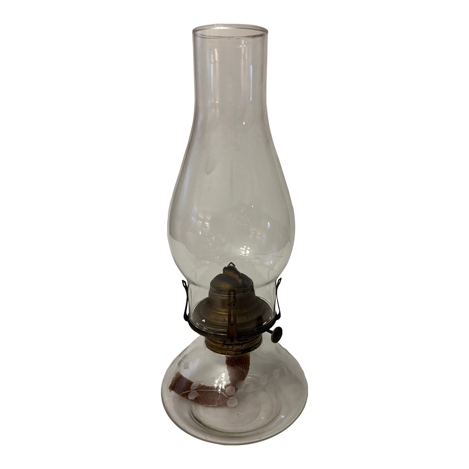 Antique Etched Floral Oil Lamp: Antique oil lamp with beautifully etched floral design on base clear glass hurricane in working order. Condition: Alterations: Original Condition Unaltered Imperfections: Some Imperfections Condition 