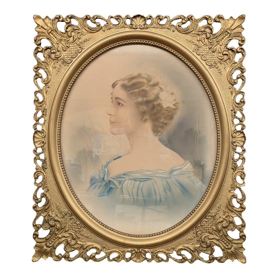 Victorian Era Portrait of Woman in Blue Dress: Victorian era portrait of woman in blue dress. Appears hand colored. Late 19th or early 20th century. Gilded ornate frame. 25" W x 30" H Condition: Alterations: Original Condition Unaltered