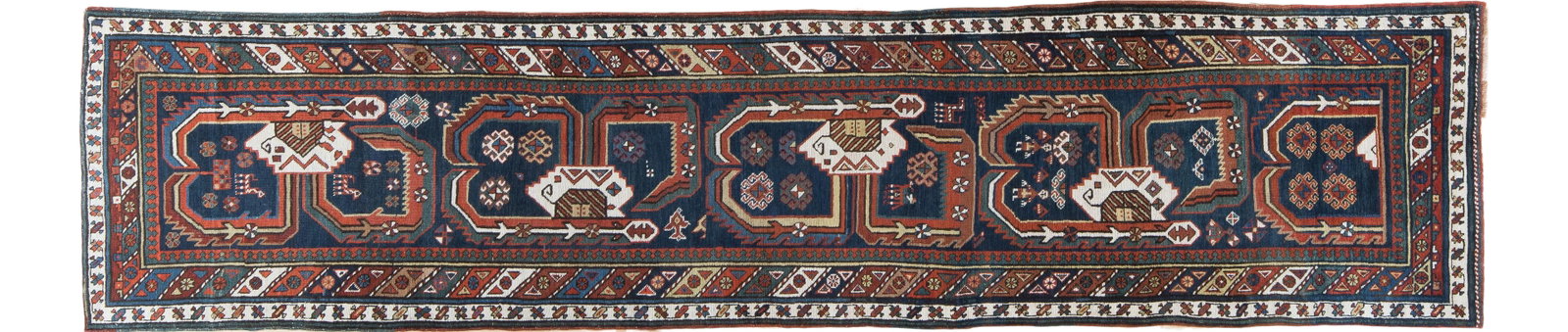 1900s Antique Persian Runner: The richly saturated dye palette includes navy,two reds,hunter green,goldenrod,dark brown,medium brown and ivory on this wool and cotton foundation runner. The 4 1/2 module reversing pattern shows ben