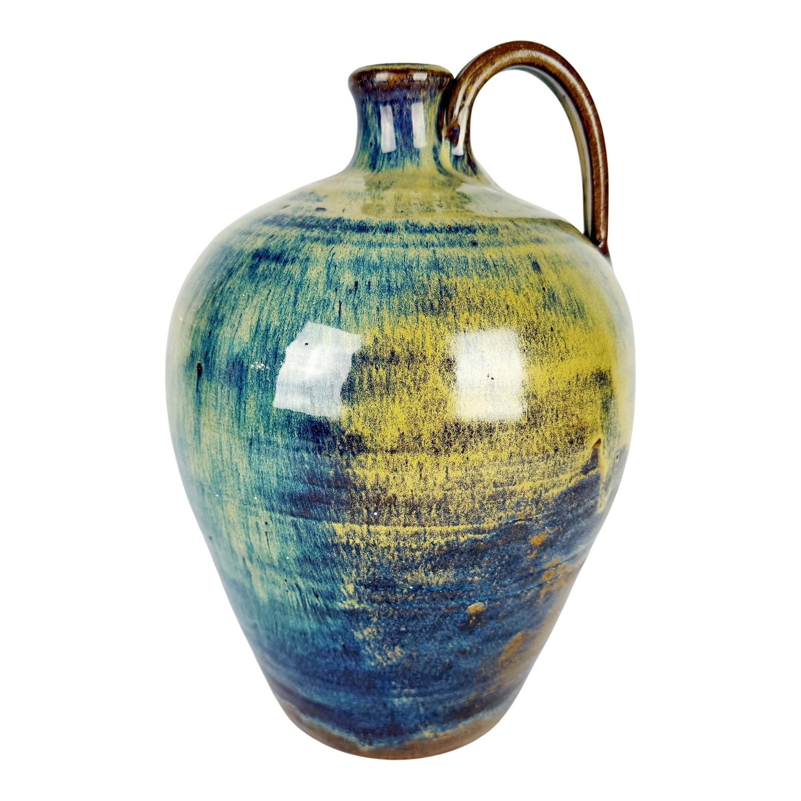 1982 Signed Studio Pottery Jug - Teague (w.d.g.) - Glazed Stoneware: A hand-thrown studio pottery jug dated 1982 and signed on the base "Teague, W.D.G." This sculptural stoneware vessel features a classic rounded jug form with a gracefully pulled handle and a richly la