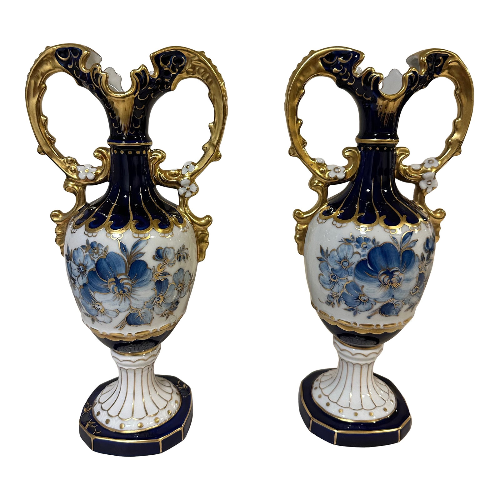 Royal Dux Pair of Porcelain Vases With Double Handles: Beautiful pair of porcelain Royal Dux cobalt blue vases with blue flowers and gold double handles. Hand-painted and made in the Czech Republic. Royal Dux stamps/markings. Seller has owned vases for 20