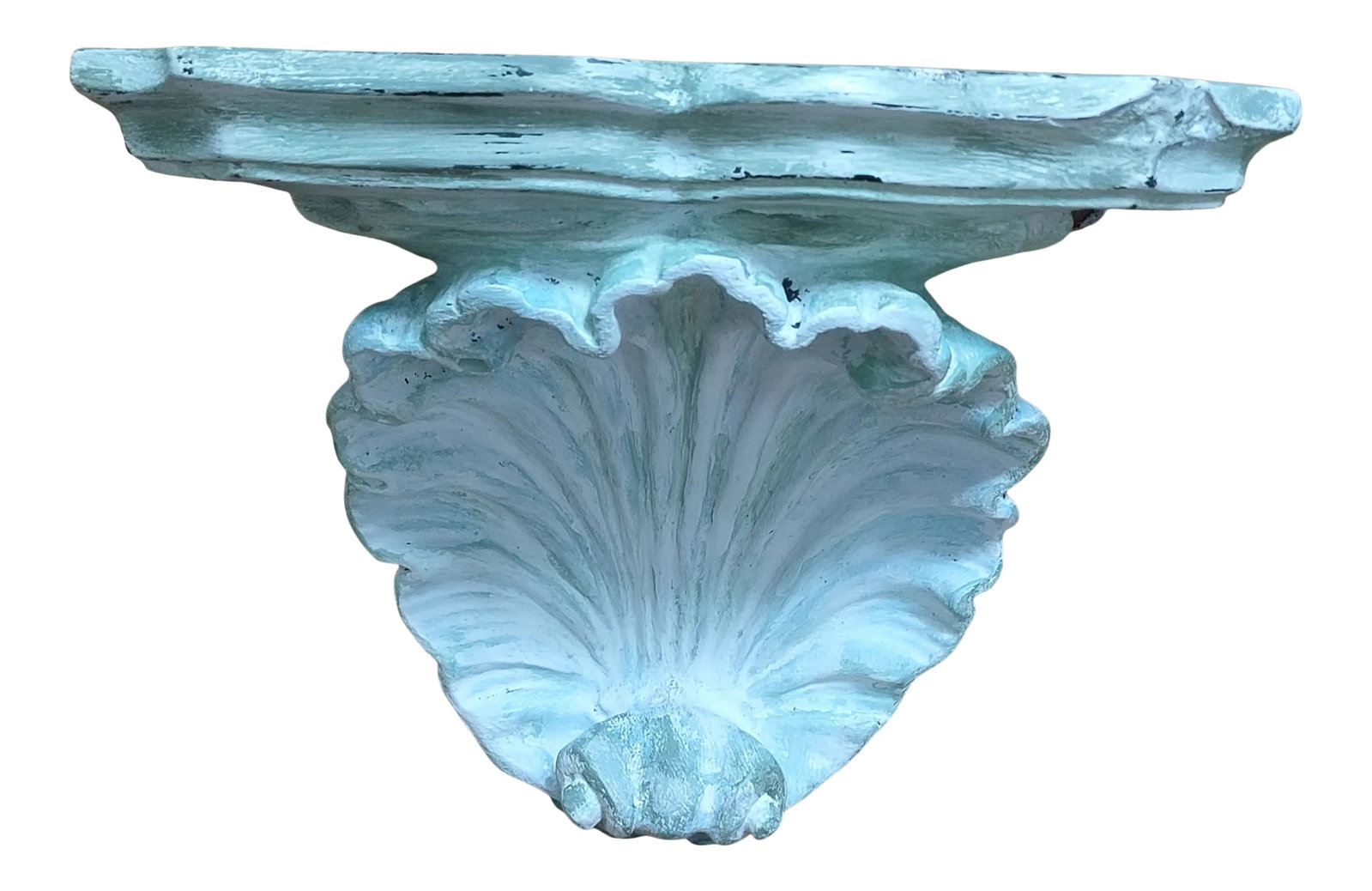 20th Century Hollywood Regency Scallop Corbel Shelf in Plaster: Bring in a bit of beach and tradition with this painted corbel scallop shelf. Made of plaster, it is lightly distressed with green paint and black accents. Its rich detail in the scallop shape,