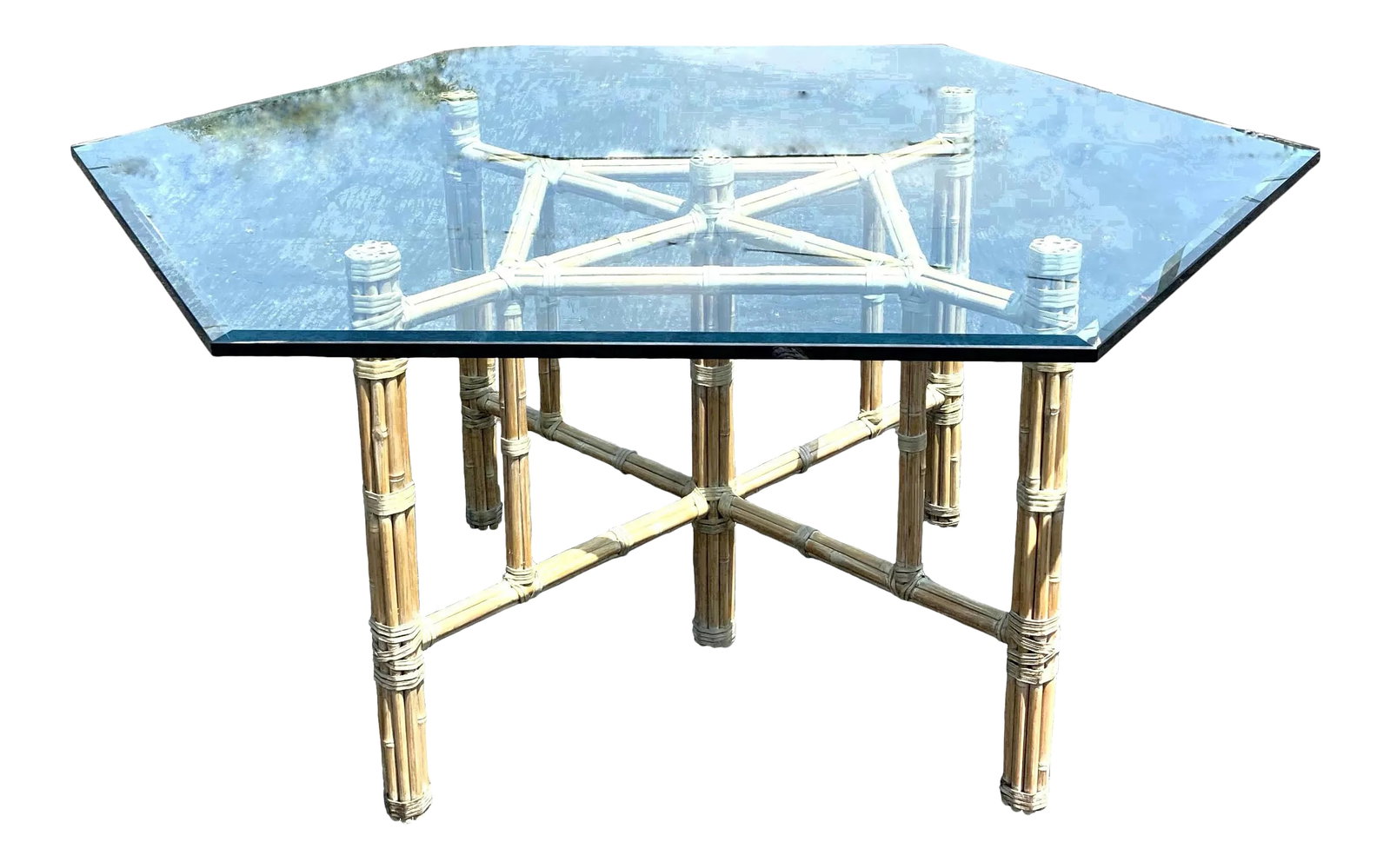 Vintage McGuire Bamboo Dining Table: A gorgeous, and iconic, McGuire, reeded bamboo dining table, in a natural, whitewash finish. Dating from the 1970's this table is classic and timeless. The plate glass top is hexagonal, with a