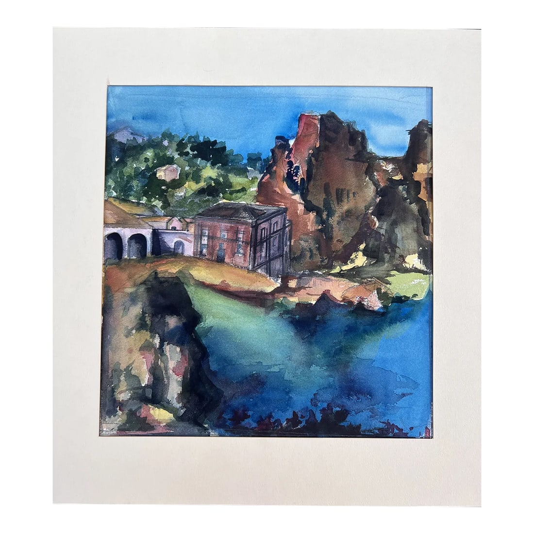 1970s Expressionist Seaside Village Scene Watercolor Painting: Watercolor, circa 1970s. Seaside village . Matted, matte shows some signs of age. Image area is 11"wide by 12" high. On reverse of watercolor paper, there is a floral still life study. Artist: June