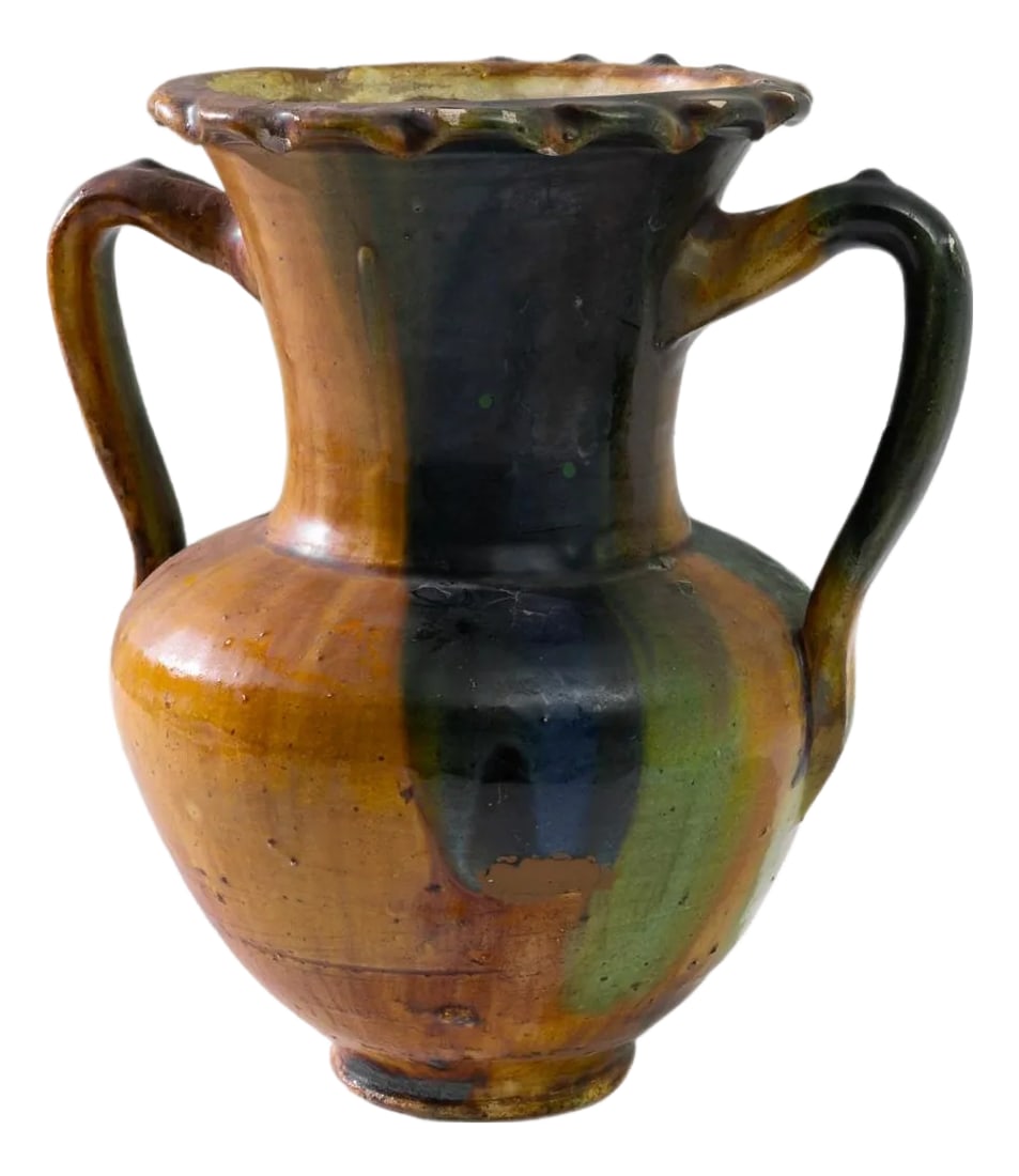 1960s Belgian Ceramic Vase: Behold the vibrant charm of this 1960s Belgian ceramic vase, a true testament to artistic exuberance. A kaleidoscope of colors orange, blue, and green splash across its surface in a lively dance of
