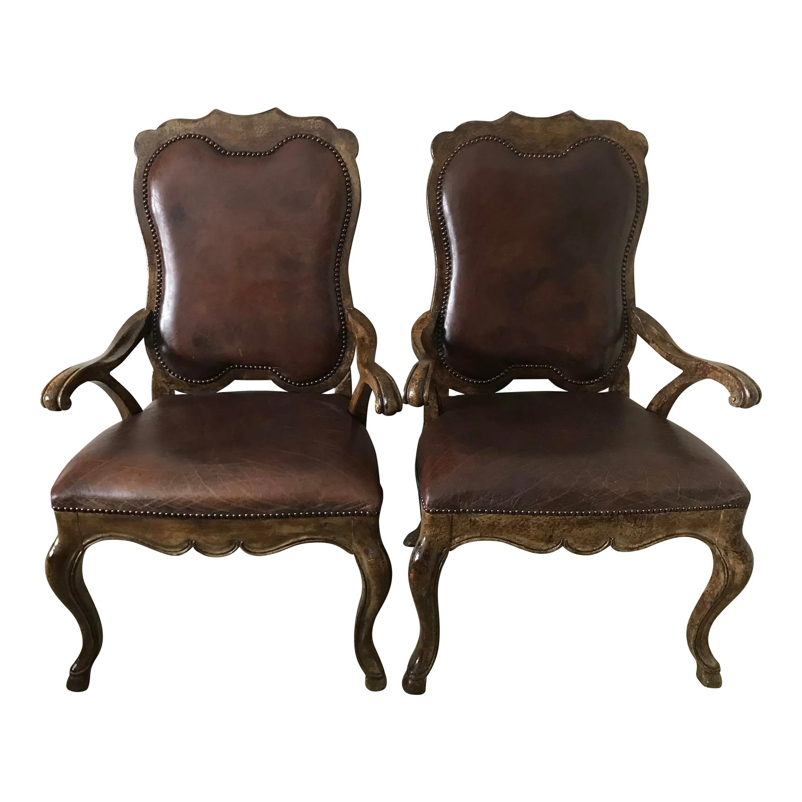 Leather Drexel Heritage Side Chairs- Set of 2: These heirloom-quality, top-grain brown leather chairs exude timeless elegance. Expertly tailored, they feature curved wood accents, iron nailheads, and superior craftsmanship, ensuring lasting
