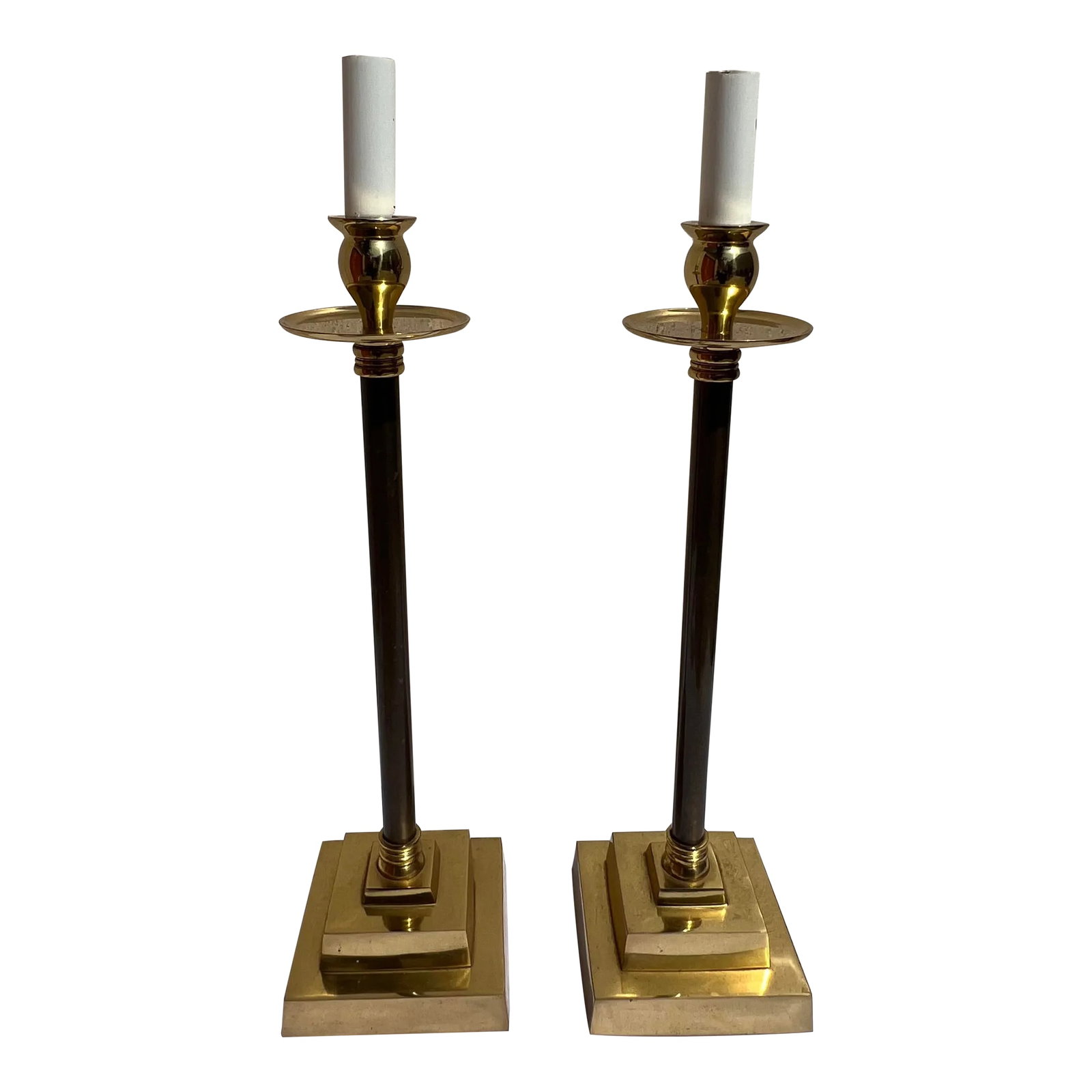 Pair of Vintage Mid 20th Century Tall Brass Lamps With Stepped Bases: Mid century pair of tall brass table lamps with stepped bases. These are working condition. They have some patina in the brass. These will need clip on shades, or used as is with decorative light