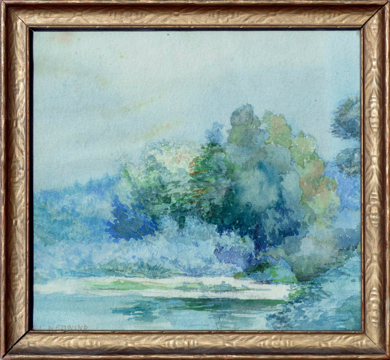 At Water's Edge by Emma Lou Redwine: Beautiful impressionistic watercolor of lush foliage at the water's edge by Emma Lou Redwine (American, 1879-1968). Signed lower left. Presented in an Vintage gold wood frame and Vintage glass. Glass 