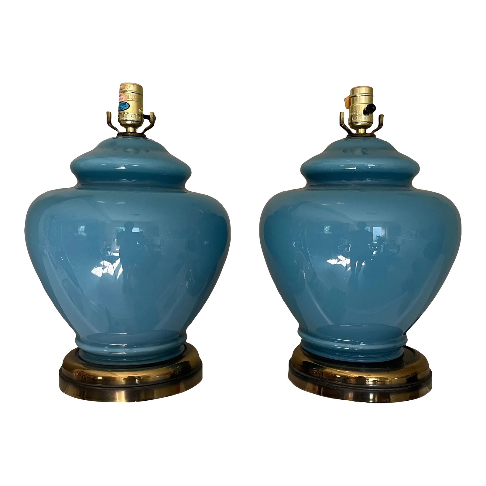 1980s/90s Postmodern Blue Glass Ginger Jar Lamps - a Pair: Pair of 1980s/90s blue ginger jar glass lamps on brass bases. Height: 16.5 Width at widest part of jar: 10" Width of brass base: 8" Condition: Alterations: Original Condition Unaltered Imperfections: 