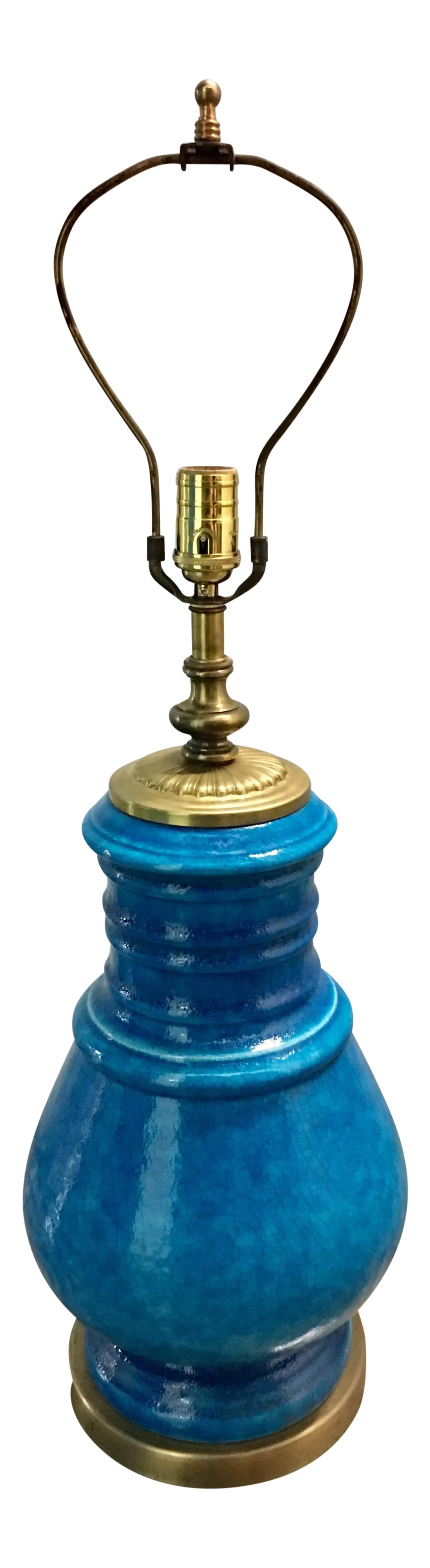 Mid-Century Turquoise Ceramic and Brass Lamp: Vintage mid-century turquoise, slightly crackled ceramic table lamp with brass base, neck and canopy. These have been polished and has been rewired. It's in excellent condition. 25"H to socket 32"H to
