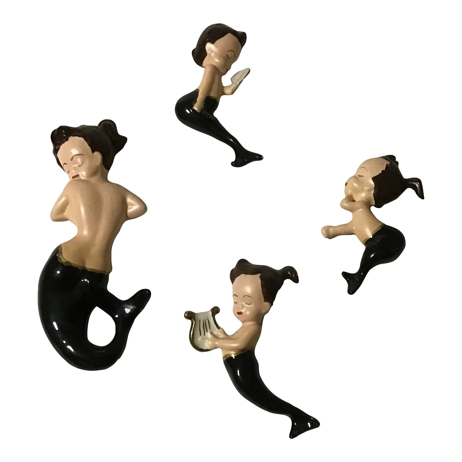 1960s Palm Beach Coastal Mermaid Wall Hanging- Set of 4: Palm Beach Coastal Figural Wall Hanging Set 4 Rare Set with closed eyes Very hard to find a set of 4 Larger one about 8" The little ones has a comb and mirror a Harp and sleeping one Dated 68 Mt Follo