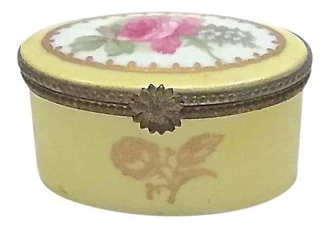 Antique Porcelain Rose Limoges Box: Antique; 19th century, Limoges, porcelain, box with brass hinge and floral clasp. Hand-painted rose on the lid and gilt rose on front side below clasp. Gilt accents. Marked "Made In, Limoges, France"
