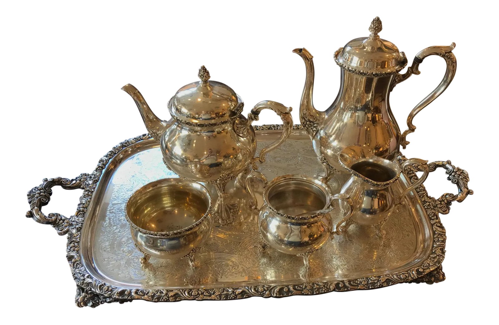 Wilcox Silver Plated Tea/Coffee Set: This Lovely Silver Plated Tea And Coffee Set By Wilcox Will Add A Touch Of Old World Charm And Style To Any Table! Consists Of Tea Pot, Coffee Pot, 2 Sugar Pots; One W. Handle, One Without And A Cream