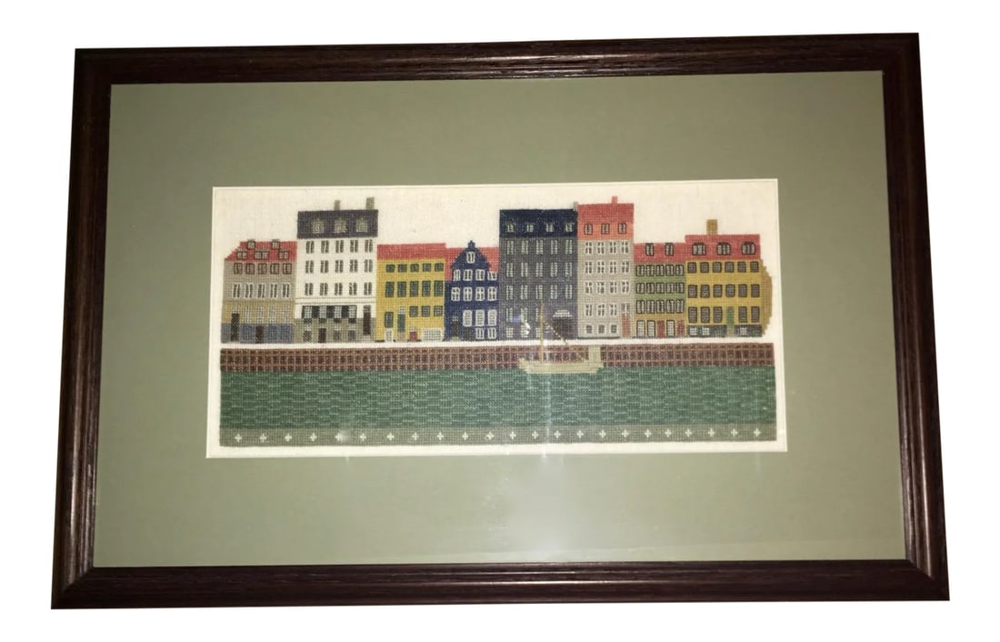 Handcrafted Needlepoint of Danish Waterfront: Nyhavn (Danish pronounciation) nyhaw'n; New Harbor is a 17th century waterfront, stretching from Kongens Nytorv to the harbour front just south of the Royal Playhouse. This colorful handcrafted counte