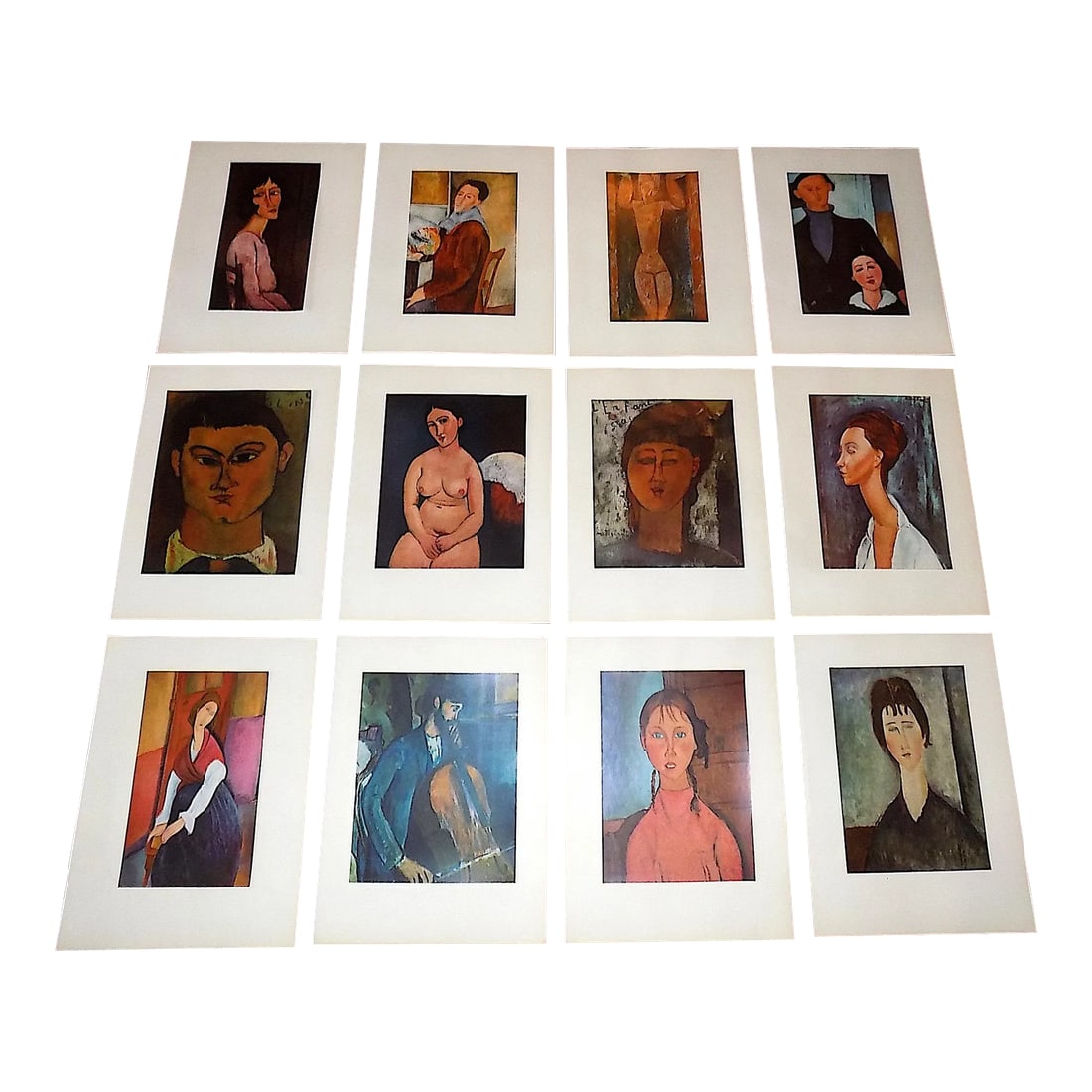 Vintage Amadeo Modigliani Modernist Folio Size Lithographs - Set of 12: This vintage set of twelve (12) lithographs (offset) by the world famous artist Amadeo Modigliani (Italy/France 1884-1920) is from a mid 20th century portfolio. Great color and composition, the images