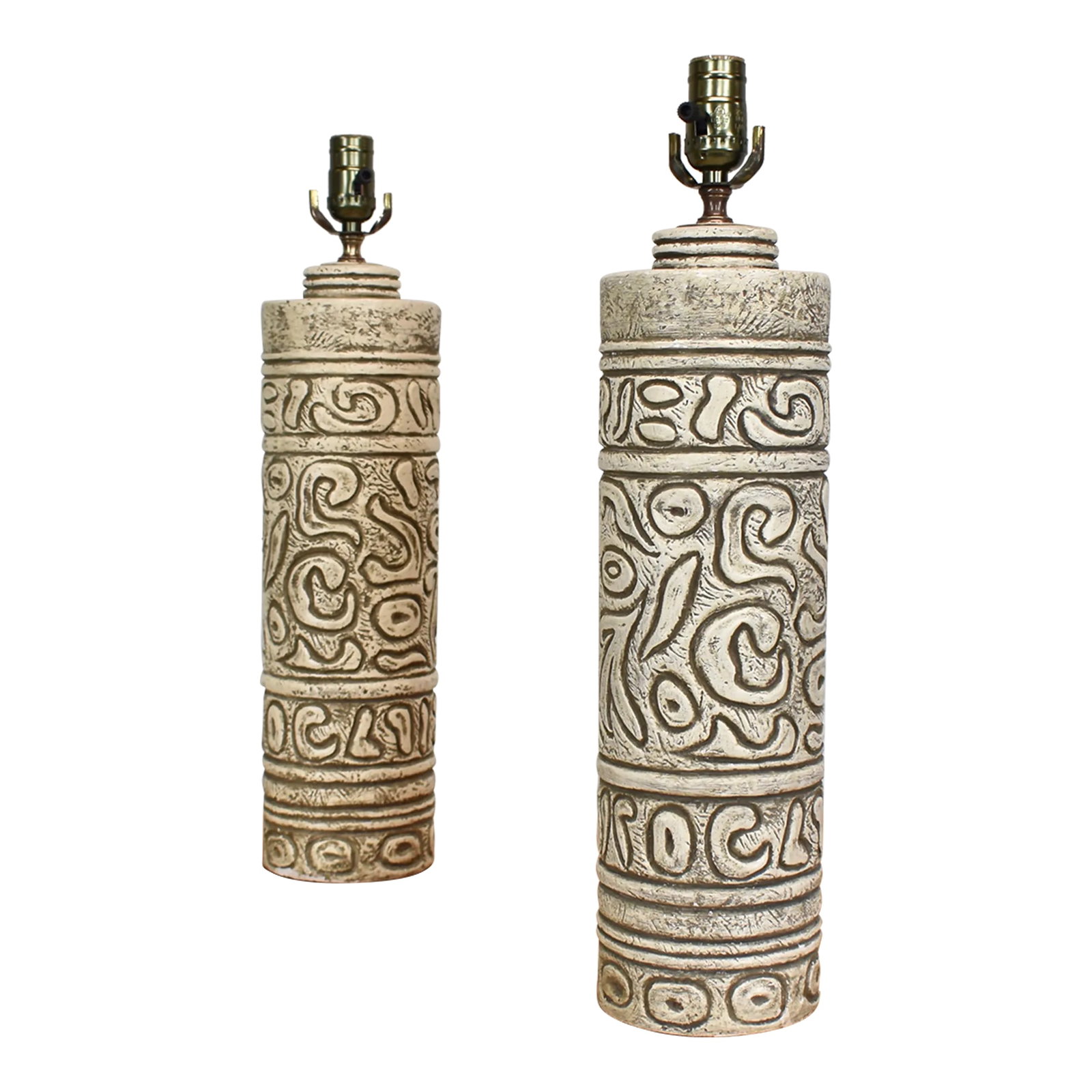 1960s Raymor Bitossi Italian Ceramic Style Table Lamps - a Pair: Large and substantial ceramic table lamps attributed to Raymor Bitossi circa the 1960's. Lamps feature a striking carved pattern to their surfaces and are quite heavy. Lamp sockets have been replaced 