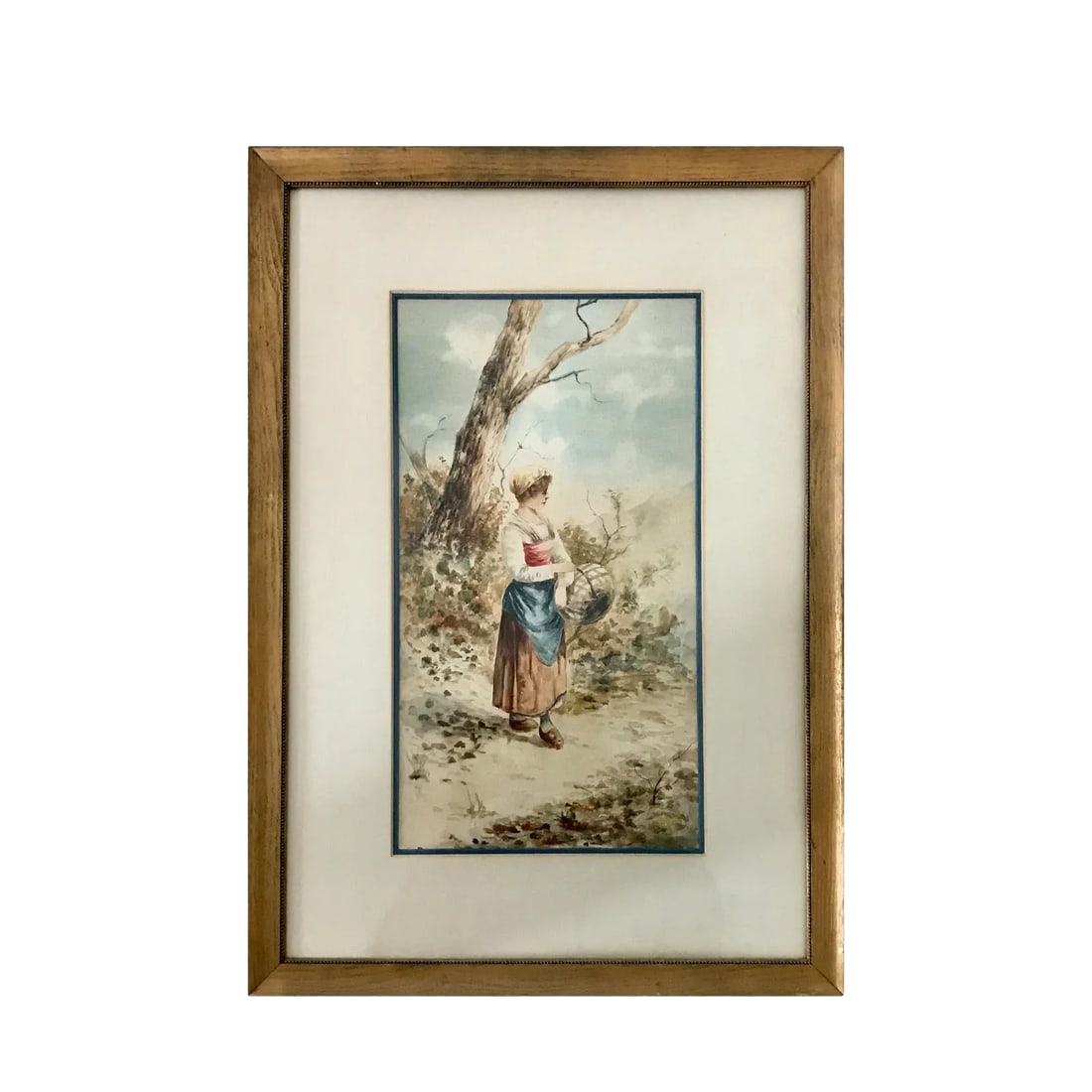 19th Century Antique Watercolor Landscape With Figure Painting: A Nineteenth Century Continetal landscape with figure, watercolor on paper. A young woman carrying a basket on a wilderness path is at the center of the painting. The work is softly painted in subtle