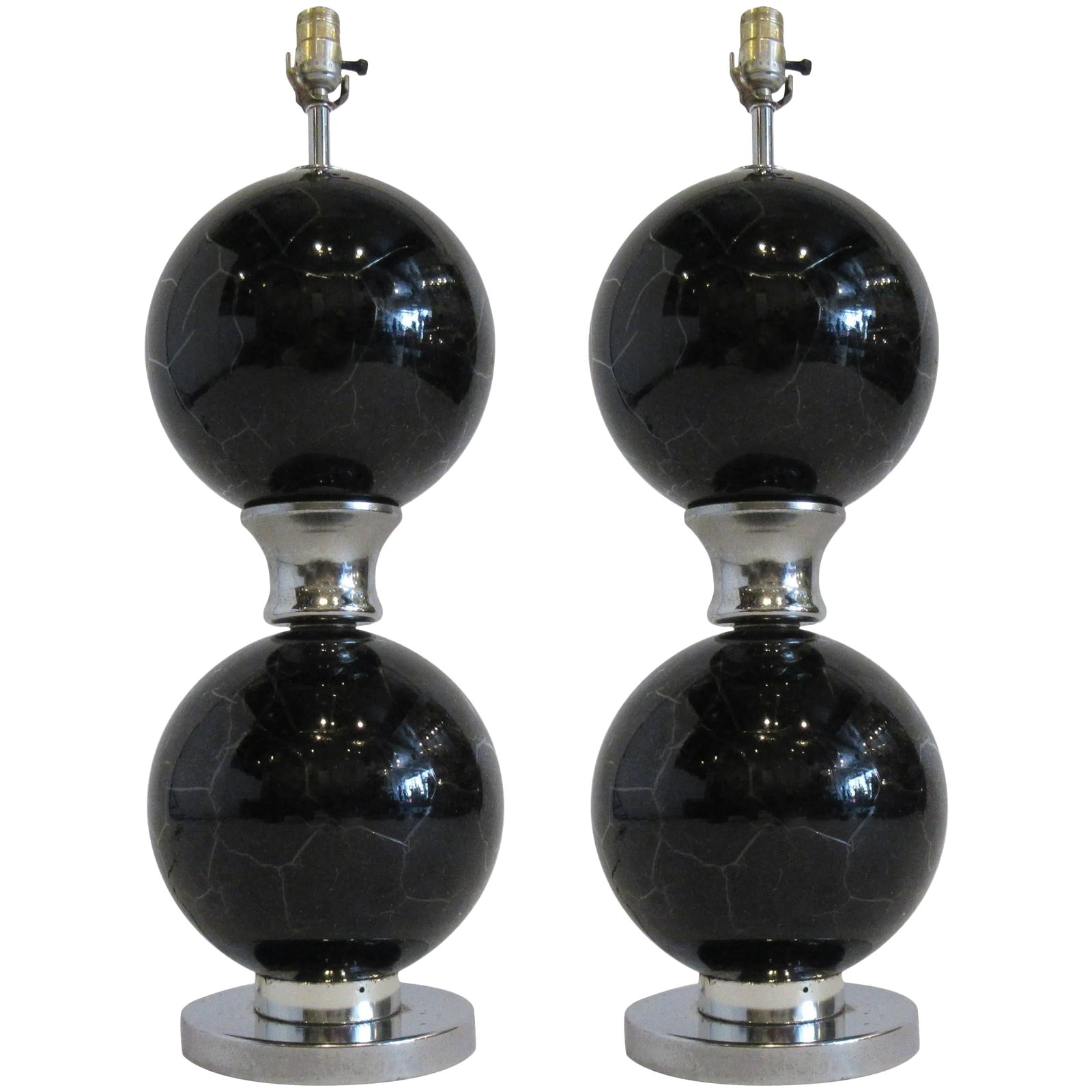 1970s Black and Chrome Crackled Glass Lamps - a Pair: Pair of 1970s black and chrome crackled glass lamps. Condition: Alterations: Original Condition Unaltered Imperfections: Some Imperfections Condition Notes: Good some wear on the chrome shown in