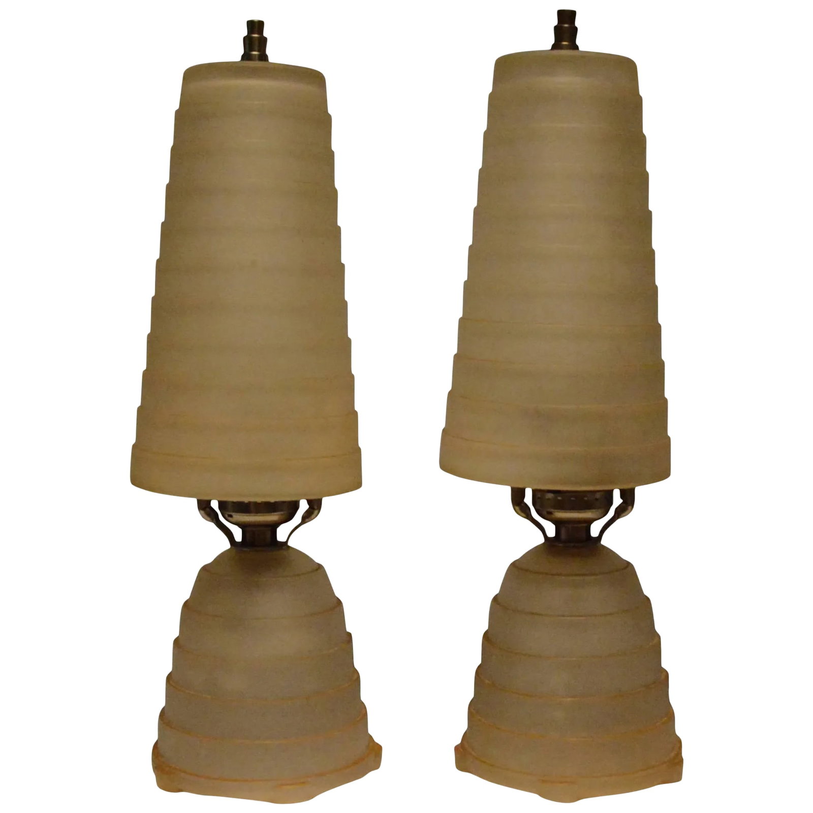 Art Deco Vanity Lamps Set of Two - a Pair: This is a nice pair of vintage Art Deco vanity lamps. They have soft gold frosted with stepped glass shades and matching base. Each lamp retains its original finial and takes a tubular bulb. The cords