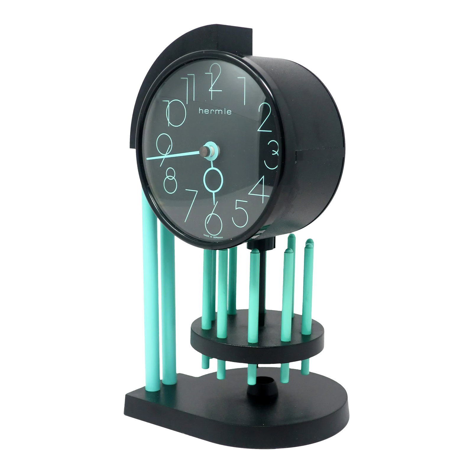 1980s Desk or Mantle Clock by Hermle: An outstanding black and aqua blue desk or mantle clock by Hermle, a 100 year old German clockmaker. With all of the panache of the postmodern era, this clock most likely dates from the mid-1980s. It 