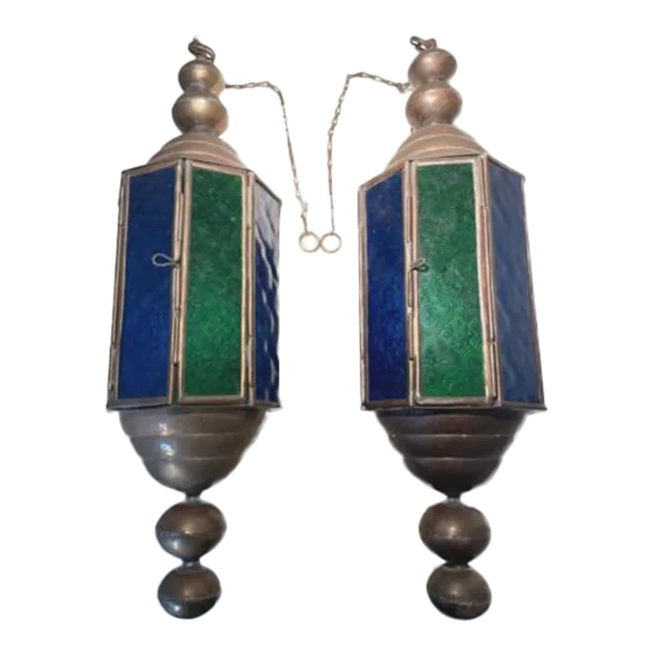 1940s Vintage Stained Glass and Brass Church Pendant Light Fixtures a Pair: This is an unusual pair of working stained glass pendants from a church in Michigan. Blue and green panels of etched glass form octagonal shapes with round double brass finials above and below. Outfit