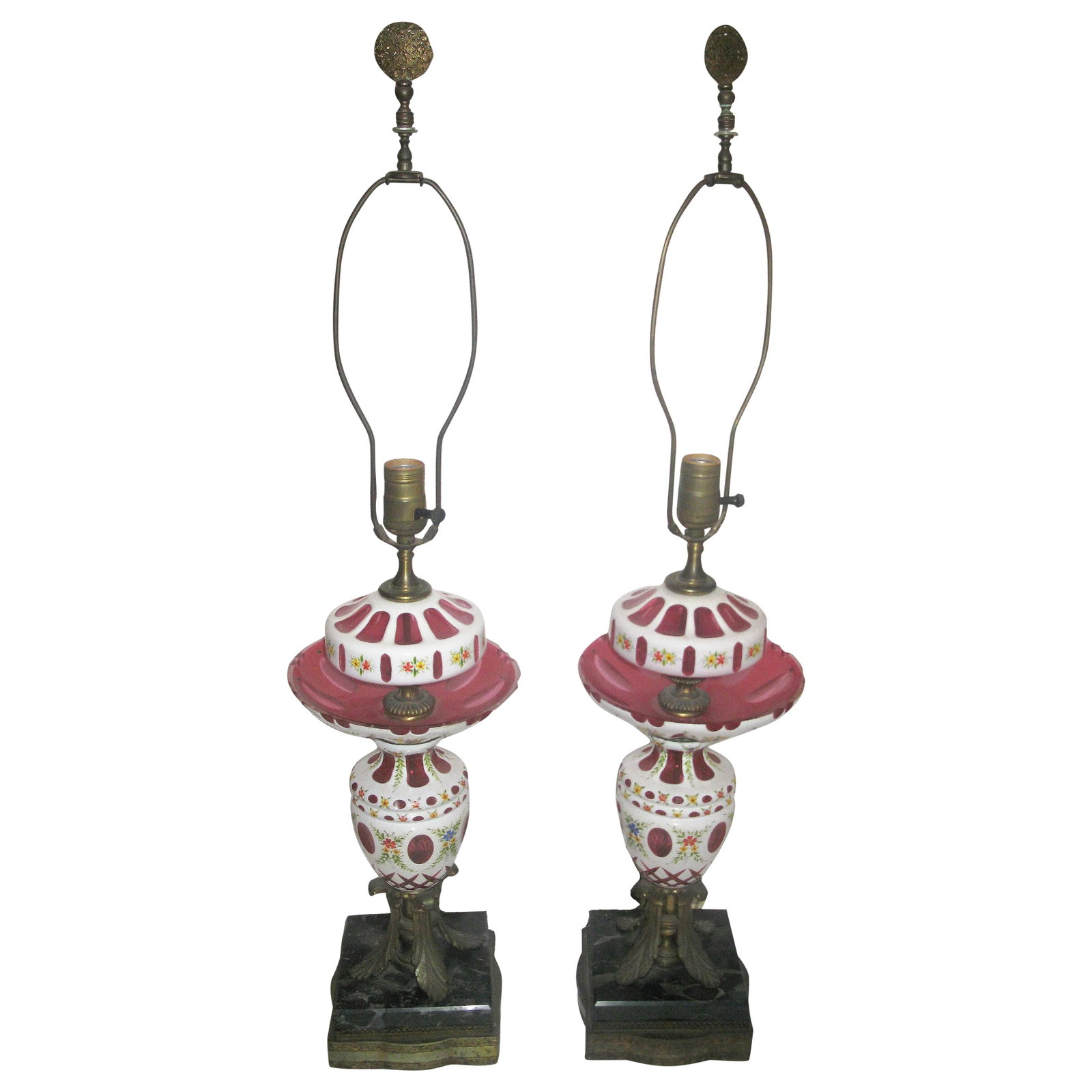 White & Cranberry Glass Bohemian Lamps - a Pair: A pair of white glass overlay and cranberry glass Bohemian table lamps The lamps are in excellent condition, especially the glass, which has no nicks or chips. The original finials are still on the