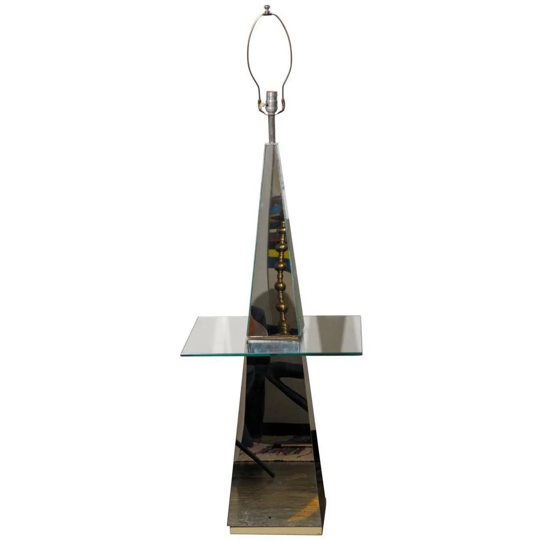 Midcentury Modern Mirrored Floor Lamp With Glass Table: Vintage mid-century modern floor lamp made of mirror glass in a pyramid shape and holding a glass table top. Condition: Alterations: Original Condition Unaltered Imperfections: Some Imperfections