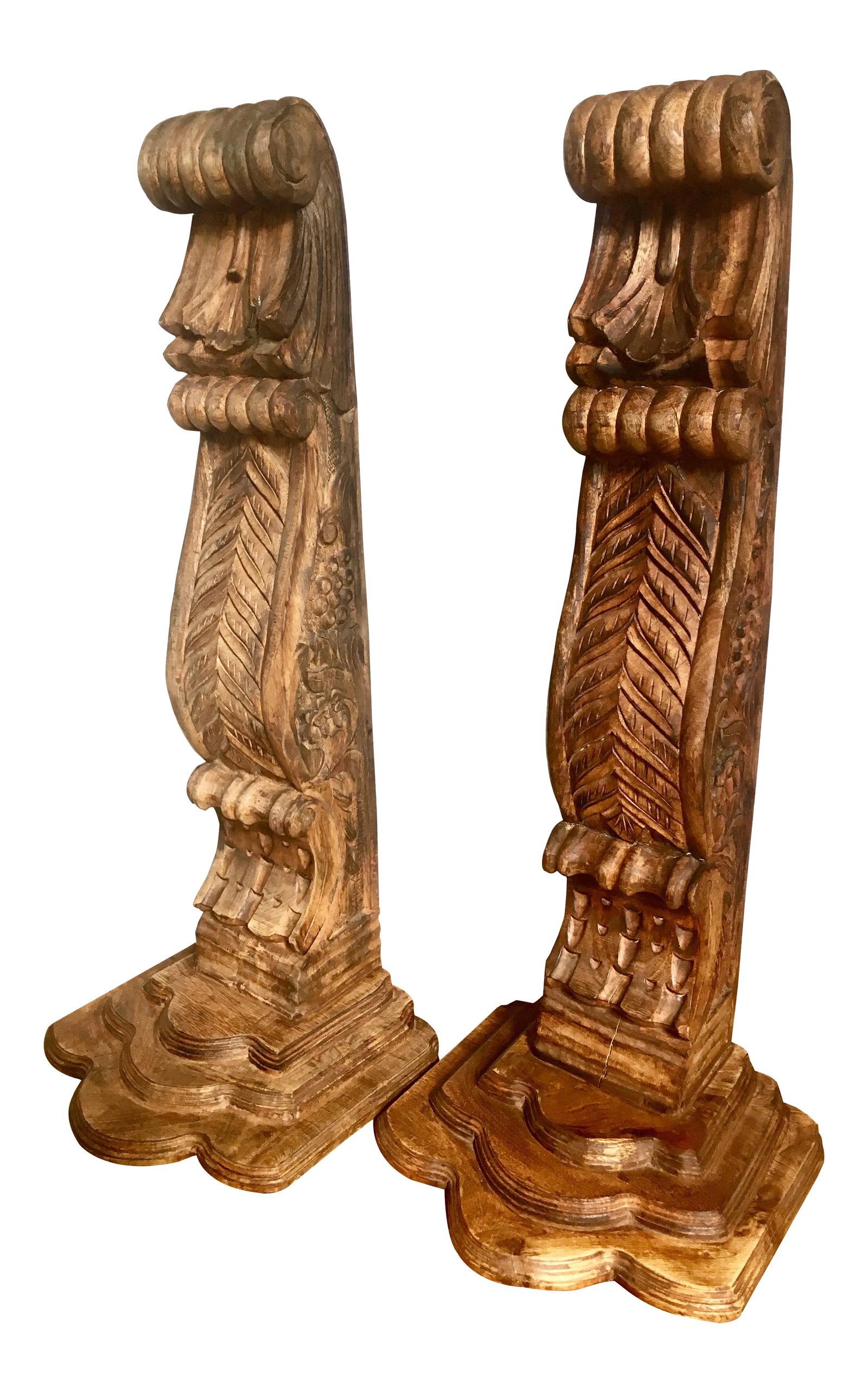 Carved Mahogany Architectural Corbels - a Pair: Two massive 32.5" tall hand-carved mahogany corbels with stepped shelf in a natural, rustic finish. Shelf Top: 13.125" x 11.75" Bracket: 5.5" x 5" x 29.5" Spanish Colonial Collection GrpB 7.27 Con