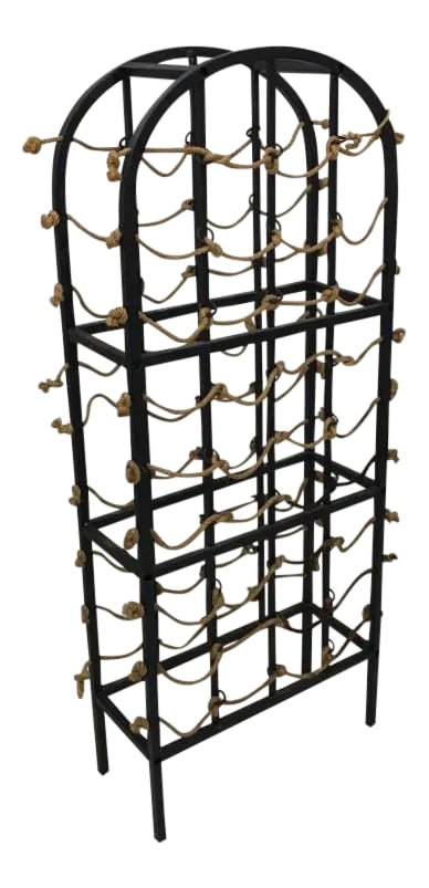 Vintage Iron and Rope Boho Chic Wine Rack: This beautiful vintage wine rack is the perfect mix between function and artsy. The base is made of iron that it is complemented with the rope to hold the bottles and to give it a touch of boho chic.