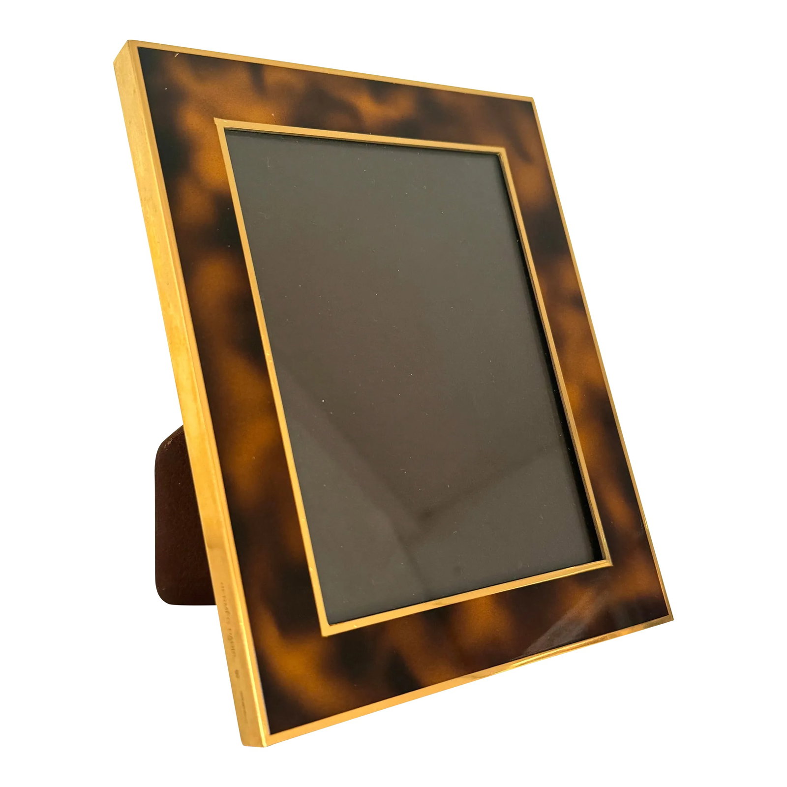 Vintage Hermes Tortoise Brass Picture Frame: Vintage Hermes tortoise frame. Edged in brass. Leather back. Hallmarked on side and on leather. In excellent vintage condition. Site for a photo is 3.5"x4.75". Holds a 4x6" photo. Condition: