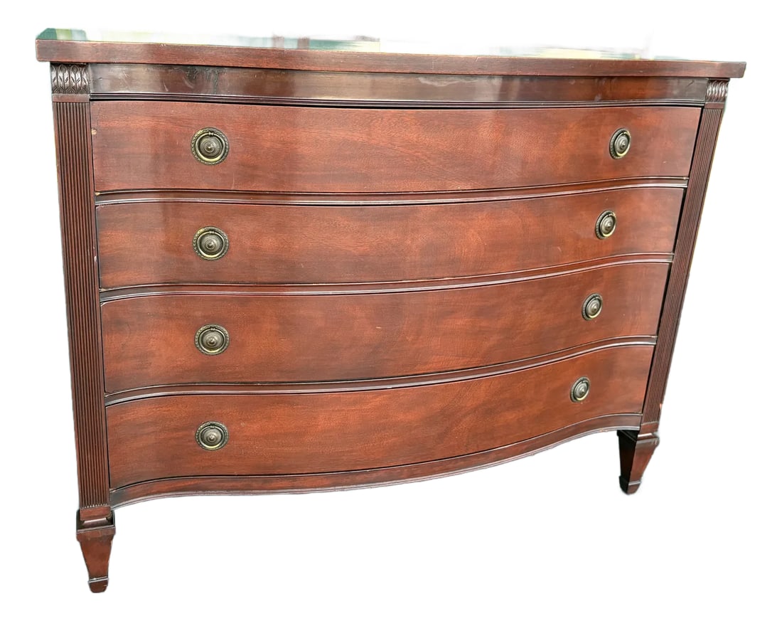 Traditional Drexel Bowfront Chest: These never go out of fashion. Solid frame, gorgeous curved front, and brass ring pulls make it a great piece for many settings and one to pass down generations. Utilize it in the dining room,