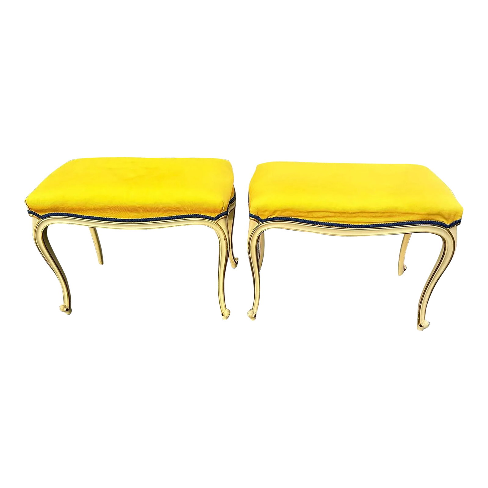 1960s Matching Pair Louis XV Wood Rectangular Ottomans: This is a pretty pair of French Louis XV ottomans. It is always a bonus when we find two ottomans. These are wood and they are upholstered in bright yellow with a blue border. The fabric is clean if y