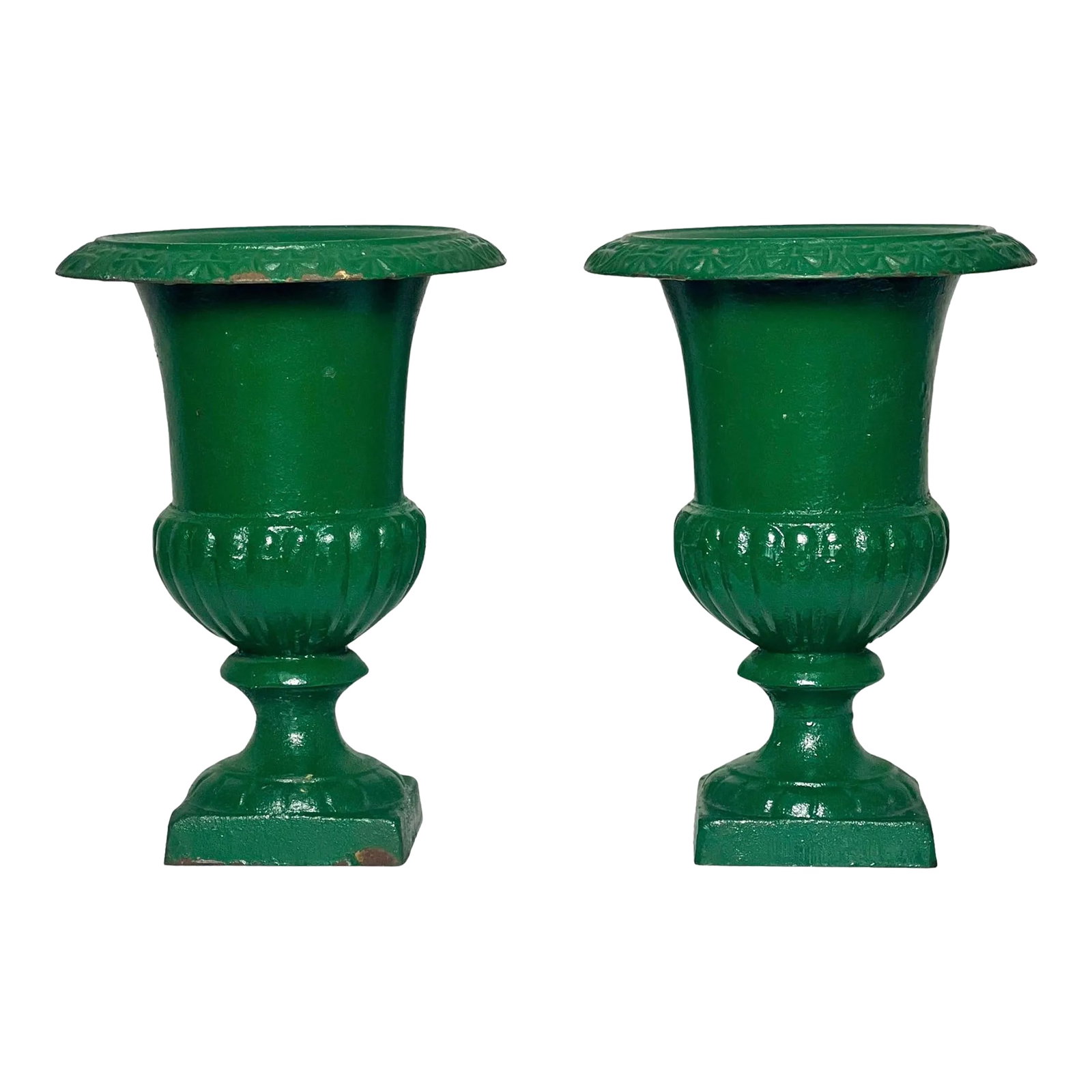 Pair of 20th Century French Green Cast Iron Urns: Beautiful pair of green painted French Medici style cast iron urns, early 20th century. Classic design with a gadrooned, bell-shaped body and decorated flared rim with a round foot on an integrated