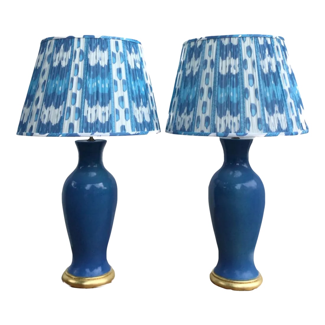 Pair of Mid-Century Ceramic Lamps: Pair of Mid Century Ceramic Lamps in French Blue with Blue Shirred Ikat Shades Fabulous pair of Mid-Century vintage ceramic lamps in French blue with gold leaf wood base and new shirred blue ikat cott