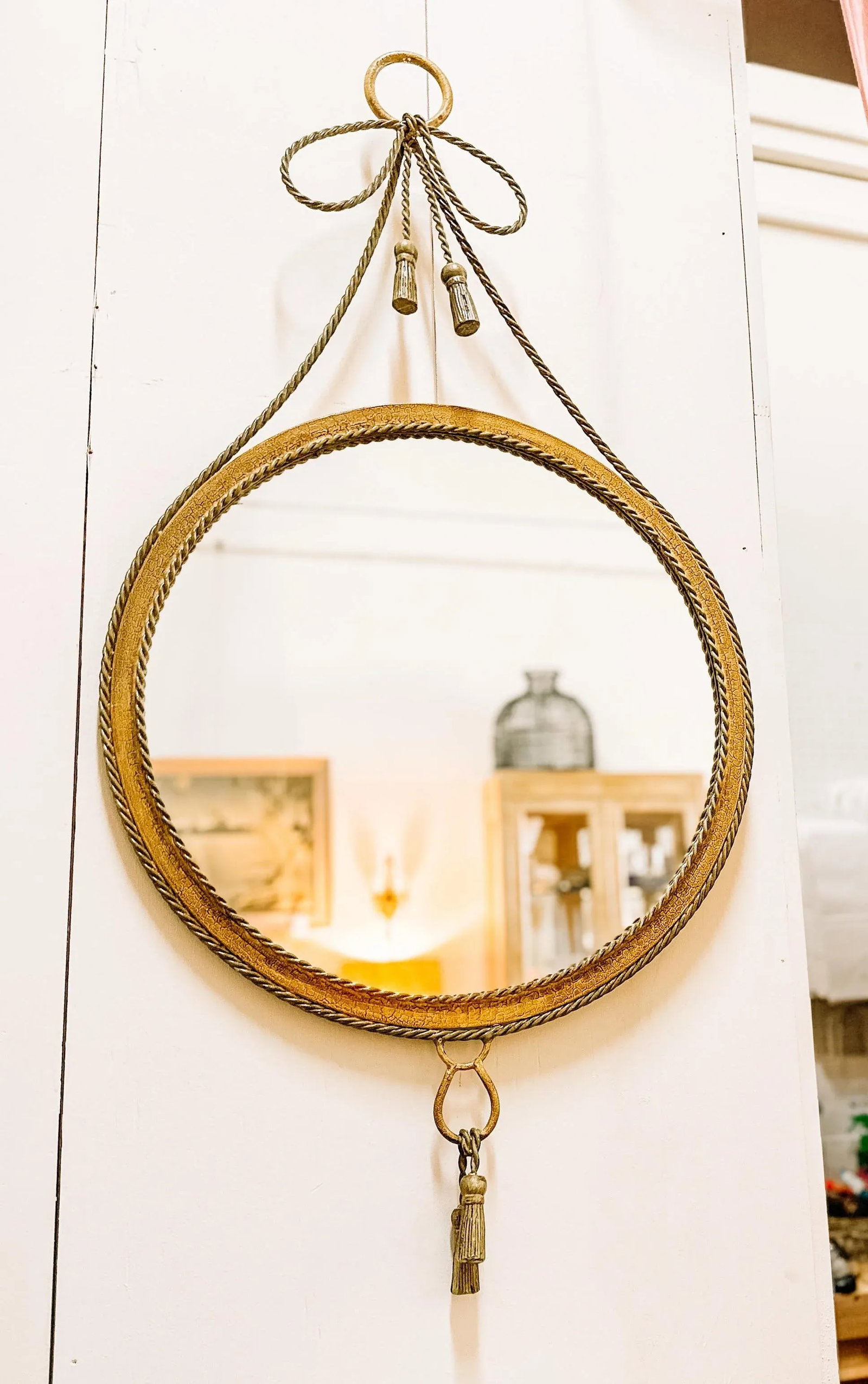 Vintage Hollywood Regency Faux Bois Painted Round Metal Mirror With Bow and Tassles - 2