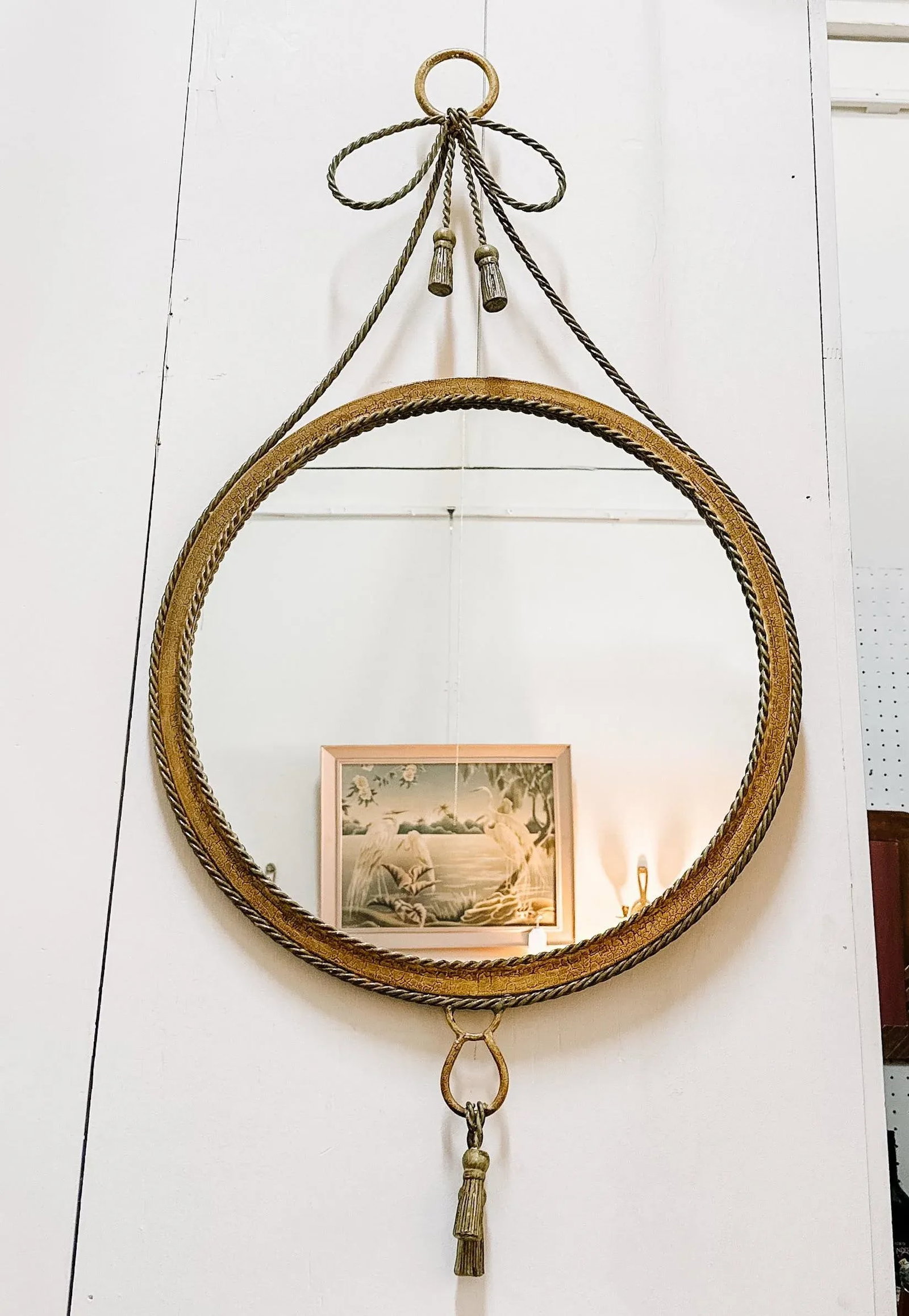 Vintage Hollywood Regency Faux Bois Painted Round Metal Mirror With Bow and Tassles - 3