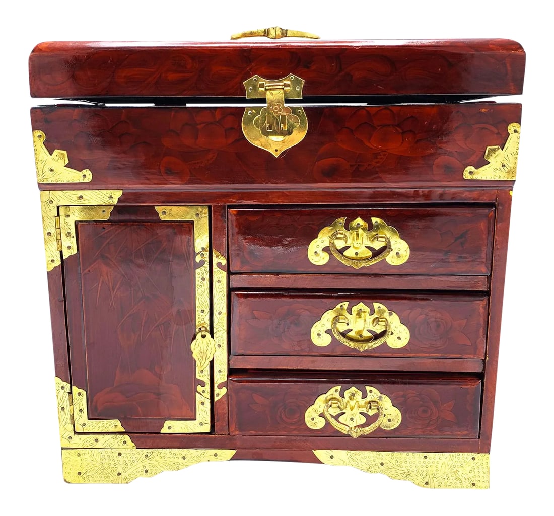 Vintage Chinese Jewelry Box With Brass Handle and Fittings: Vintage ornate mid century Chinese jewelry box / treasure chest with brass handle and fittings. The body of this piece is stunning - a glossy lacquered deep brown with red tones and subtle floral