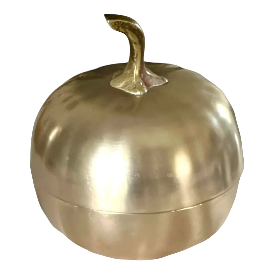 Vintage Brass Pumpkin Form Lidded Box Object #3: A charming, vintage brass lidded box in the form of a pumpkin. Features a solid brass body cast in the form of a pumpkin, with etched ribbing and a cast stem adorning the top. Made in Korea.