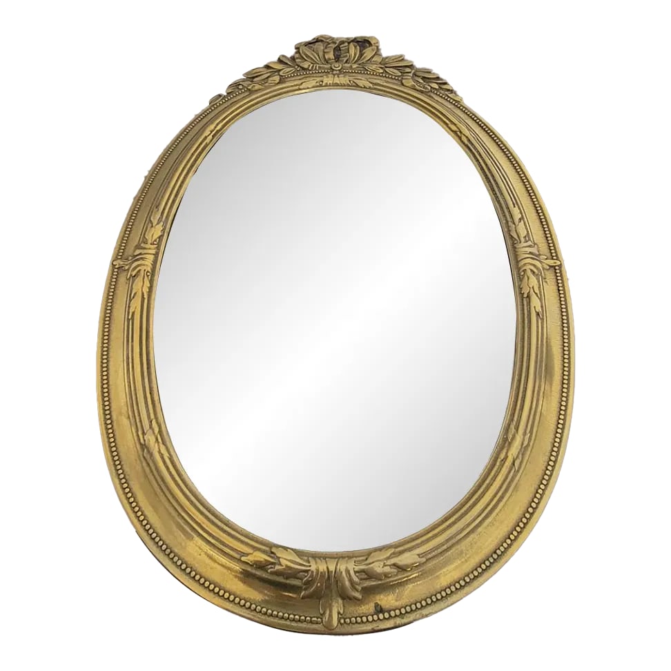 Italian Die-Cast Brass Wall Mirror in Brass Finish: Elegant Italian Die-Cast Brass Wall Mirror - Brass Finish Add a touch of timeless sophistication to your home with this Italian Die-Cast Brass Wall Mirror in a stunning brass finish. Crafted with