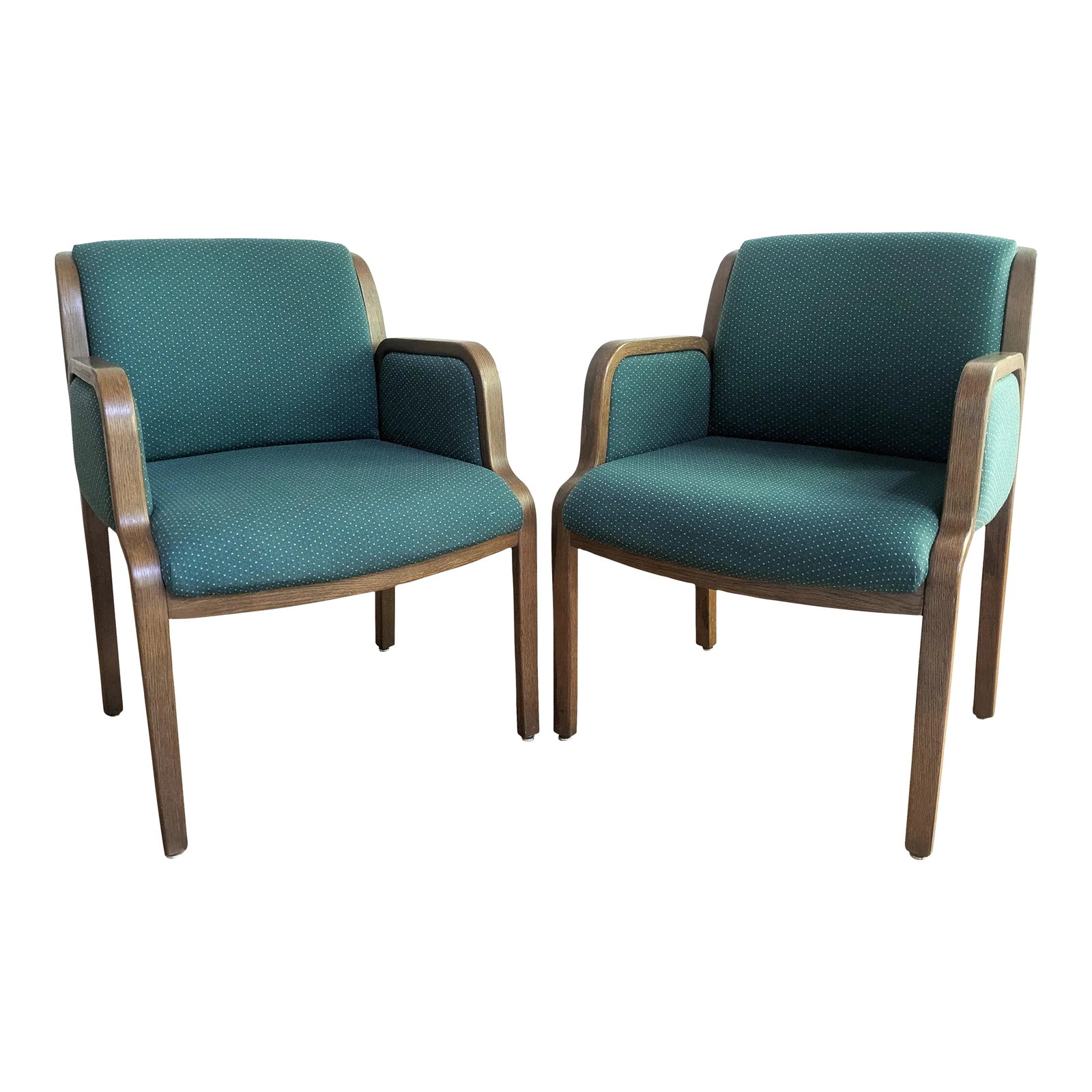 Thonet Bentwood Arm Chairs - A Pair: A pair of Thonet bentwood arm chairs. The modern armchairs are a dark oak with a unique bentwood frame and green upholstered seats. Note - Original fabric has been cleaned and sanitized. Condition: Al