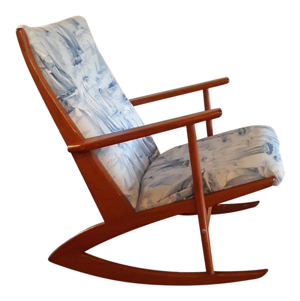 Vintage Teak Danish Modern Rocking Chair in the Style of Georg Jensen: Danish teak rocking chair in the style of designer Holger Georg Jensen. Chair is not marked, but shows great resemblance to the iconic style. Chair has newer blue and white nautical upholstery. The