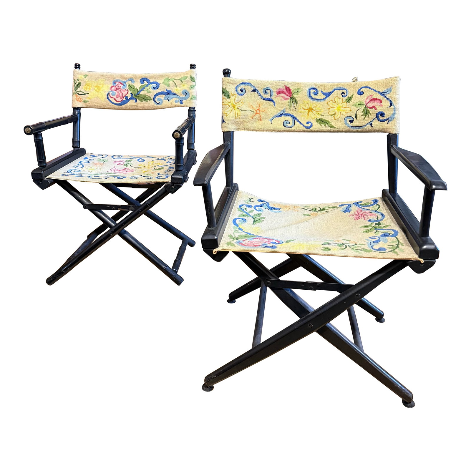 1950s Antique Embroidered Directors Chairs, Near Pair: Antique Embroidered Directors Chairs, Near Pair. Please note the frames of the chairs are slightly different as are the embroidery patterns. One frame is more traditional and the other is a faux carve