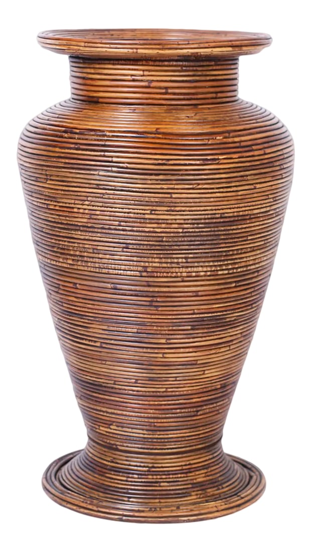 Large Pencil Reed Rattan Floor Vase: Midcentury floor vase crafted in pencil reed with a Classic form and warm lush finish. Condition: Alterations: Unknown Imperfections: Some Imperfections Condition Notes: Good Wear consistent with age 