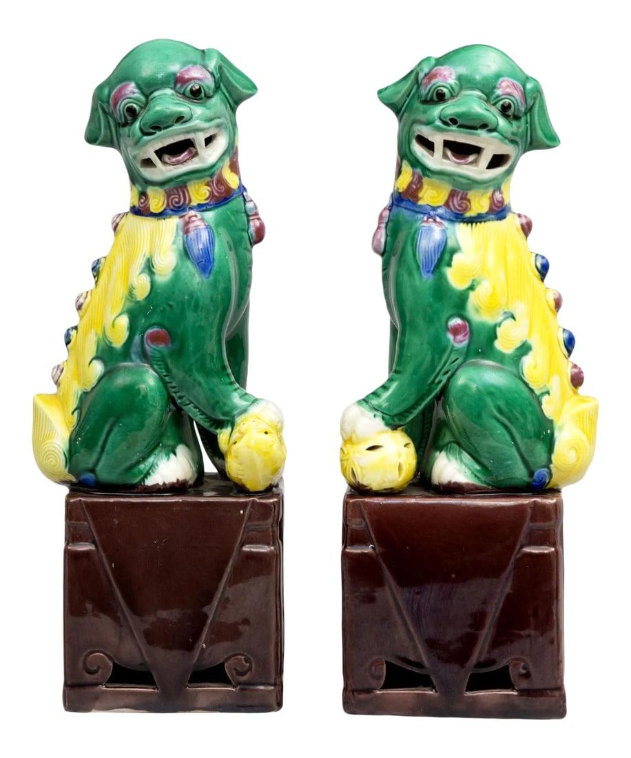 Chinese Multicolored Foo Dogs - a Pair: Chinese green, yellow, blue, red and brown male and female foo dogs sitting on a brown base. Condition: Alterations: Original Condition Unaltered Imperfections: Some Imperfections Condition Notes: Wea
