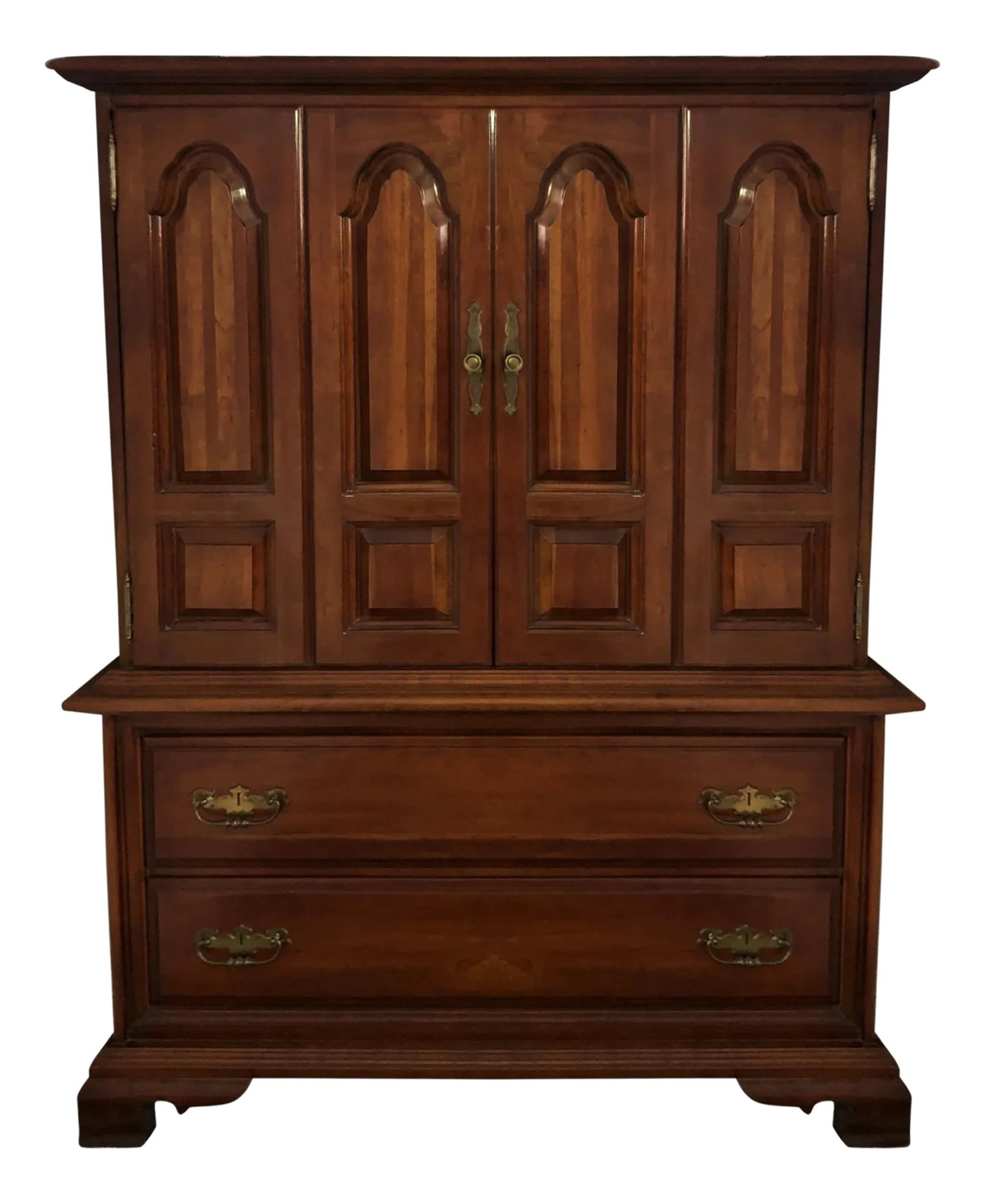 Vintage 1970s Thomasville Armoire or Bureau: Produced in the 1970s, the cabinet doors of this Thomasville armoire reveal plenty of inner drawers for storage. The bottom part of the bureau has two large drawers. 42.0"L x 22.5"D x 57.0"H. We ship 
