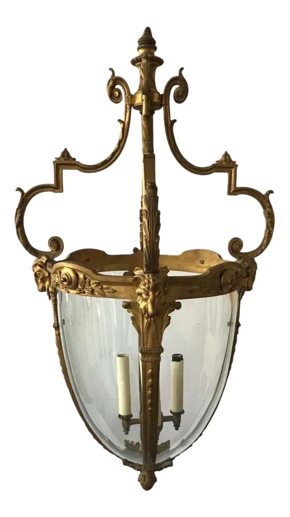 1920s French Gilt Bronze Rams Head Lantern: 920s French gilt bronze ram's head lantern. On the large side. One pane of glass is missing. I might have a person who can make one. Condition: Alterations: Unknown Imperfections: Some Imperfections